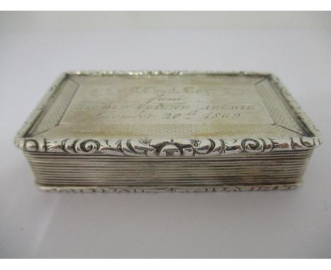 A Victorian silver snuff box, by Foxall &amp; Co Birmingham 1851, of rectangular form with an inscription to the hinged lid, 