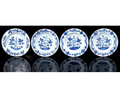 4 porcelain dishes with blue and white floral decor, China Kangxi/Yongzheng period, 22.5 cm in diameter (1 dish with restorat