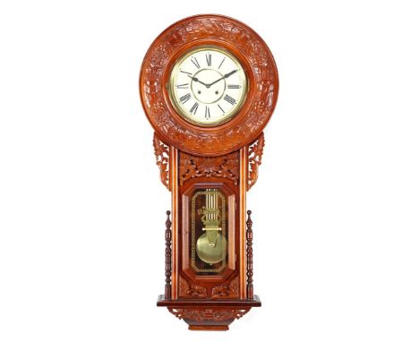After an antique model regulator in a walnut color case, approx. 150 cm high (movement replaced by quartz)