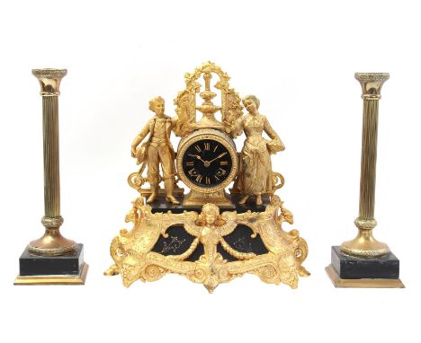 Classic zamac gilded mantel clock with black marble parts, fountain on top and figures on either side of clockwork, 36 cm hig