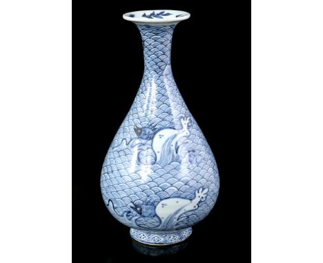 Porcelain vase with blue and white decoration of fish in waves at sea, with pattern in foot ring, China 20th century, 27 cm h