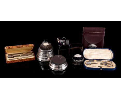 3 sewing kits, 3 pin cushions and a leather case with silver applique