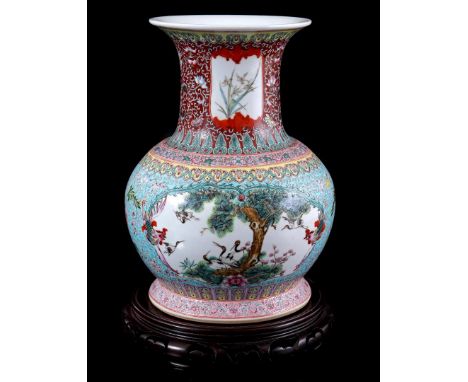 Porcelain vase with polychrome depiction in cartouches of birds in floral surroundings, China Jingdezhen 20th century, 34 cm 