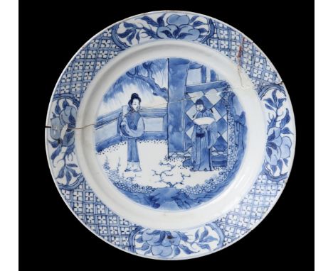 Porcelain dish with blue and white decoration of long list and monk with fan at temple, China Kangxi marked and from the peri