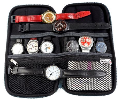 9 Swatch watches in various designs
