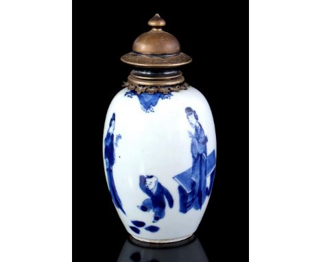 Porcelain tea caddy with blue and white decoration of fool and long lines near a tobacco plant, marked with artemisia leaf, C