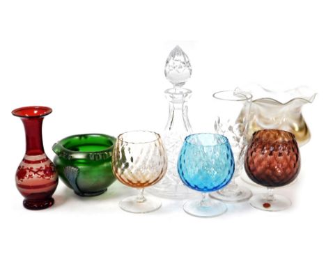 A group of 19thC and later glass ware, including a Loetz style vase and a footed vase, three vari coloured brandy balloons, a