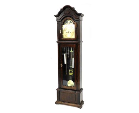 A Lincoln thirty one day oak cased longcase clock, the break arch dial with moon phase, engraved dial with chapter ring beari