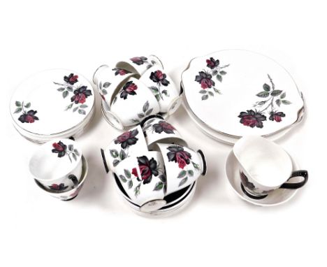 A Royal Albert porcelain Masquerade pattern tea service, comprising three bread plates, cream jug and sugar bowl, ten tea cup