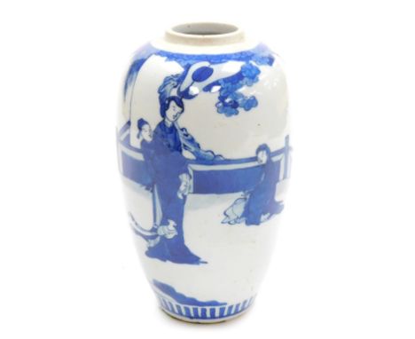 A Chinese blue and white ovoid vase, hand painted with figures on a terrace, 23cm high, lacking cover, drilled for lamp wire.