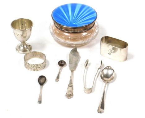 A group of small silver, to include a cut glass dressing table bottle with a silver and blue guilloche enamel lid, Birmingham