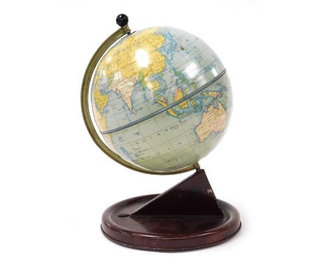 A mid century Chad Valley tin terrestrial globe, on a circular base, 28cm high.