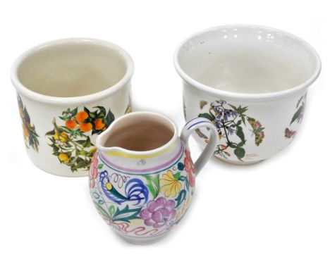 A Poole pottery jug, traditionally painted with birds and flowers, printed and painted marks, 18cm high, together with a Port