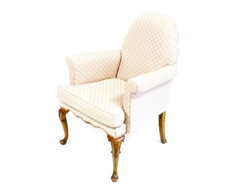 A Georgian style walnut framed armchair, upholstered in pink scale fabric, raised on shell capped cabriole legs, 71cm wide. 