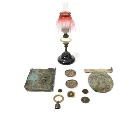 Two 18thC vintage lead insurance plaques, brass and glass oil lamp with a cranberry and frosted glass shade, pair of white me