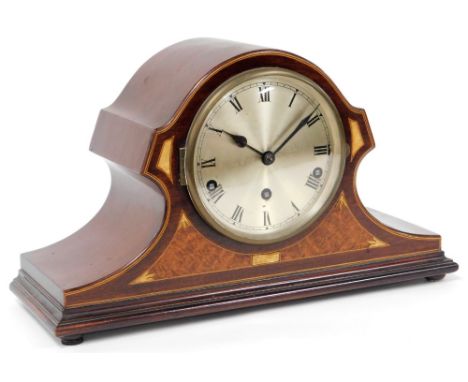 An early 20thC mahogany cased mantel clock, silvered circular dial bearing Roman numerals, eight day movement with Westminste
