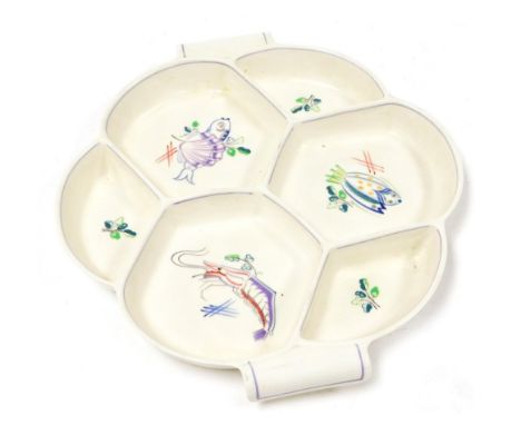 A Poole pottery six division hors d'oeuvres dish, painted with fish and leaves, printed and painted marks, 34cm wide.