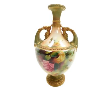 A Royal Worcester blush porcelain vase, circa 1907, of twin handled baluster form, painted by R. Austin with roses, gilt heig