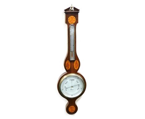 An early 20thC mahogany and inlaid Sheraton revival banjo barometer, the case inlaid with shells, rosettes, etc., a silvered 