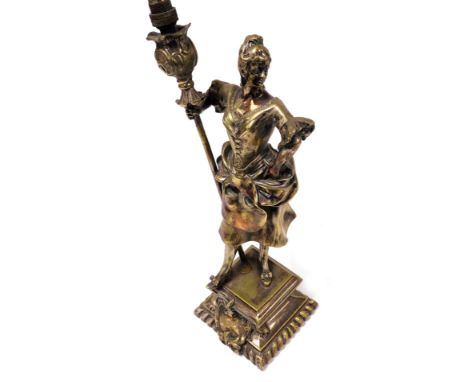 A late 19thC French silver plated table lamp, of Soubrette, cast with a lady standing on a semi fluted rectangular base, with