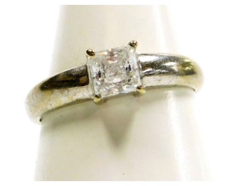 A 9ct white gold and cubic zirconia solitaire ring, square cut, size P, 3.0g. 