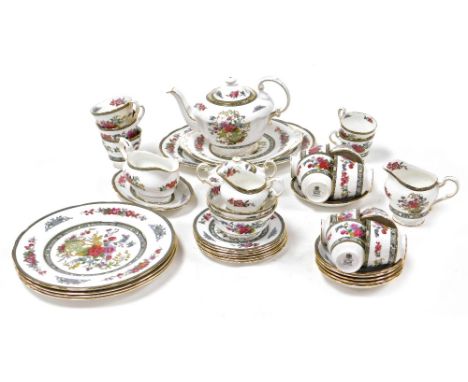 A Paragon porcelain Tree of Kashmir pattern part dinner and tea service, comprising oval meat plate, sauce boat on stand, fou