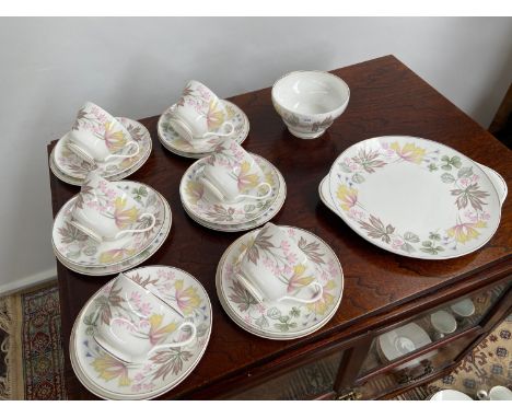 A 21 Piece vintage Shelley tea set titled 'Columbine' comes with cake plate, sugar and cream. 