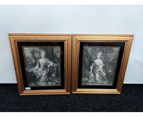 A lot of two black &amp; white portrait engravings depicting young ladies of importance, presented tastefully within gilt fra