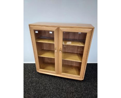 An Ercol light elm wood display cabinet [98x92x32cm] 