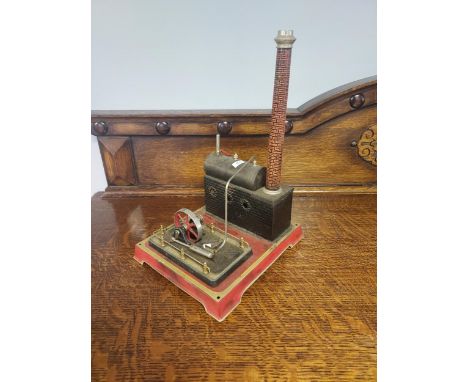 A Vintage tin plate German made steam engine. [33x23.5x20cm] 