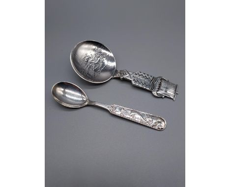 A Norwegian 830S Silver tea spoon designed with bear, fox and rabbit to the handle. Produced by David Andersen. Together with