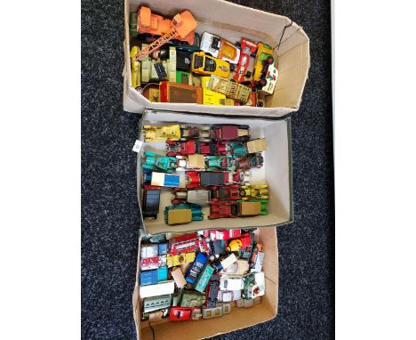 Three trays containing a collection of vintage playworn matchbox models 
