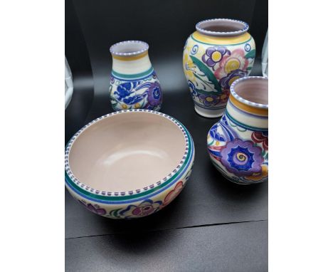 A Lot of four early Poole pottery hand painted floral and bird design vases and bowl. 