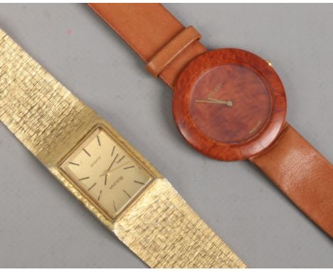A gentleman's gold plated Bulova gold plated bracelet watch and Tissot wood watch.