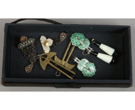 Four pairs of vintage earrings including a pair of silver and enamelled novelty peacock earrings.