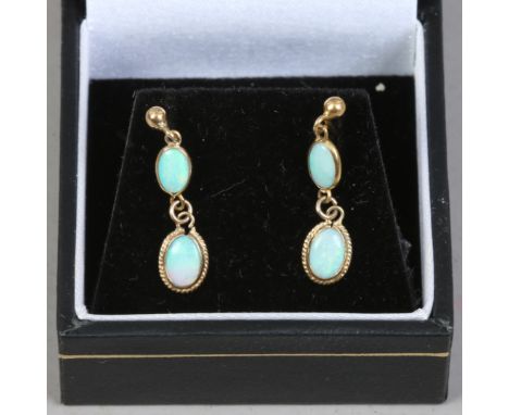 A pair of 9ct gold and opal drop earrings. 