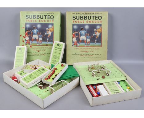 Two boxes of Subbuteo table soccer games with various teams.