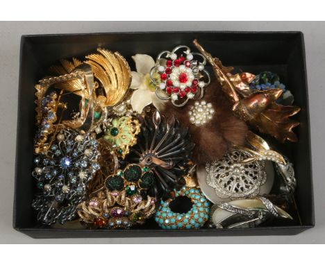 A box of vintage costume jewellery mainly brooches including mink and coloured paste stones etc.