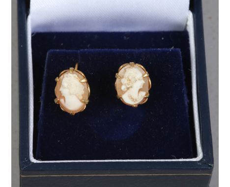 A pair of 9ct gold cameo ear studs each carved with a portrait. 