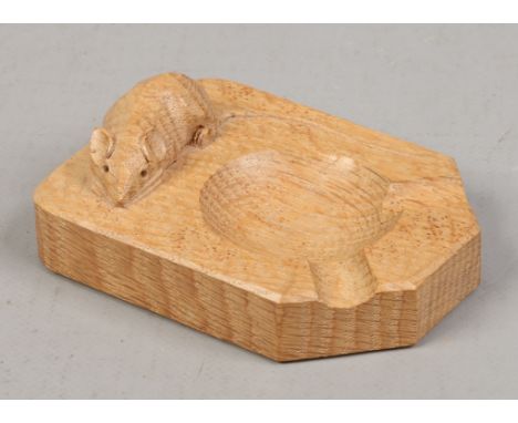 A Robert Mouseman Thompson carved light oak ashtray with signature mouse.