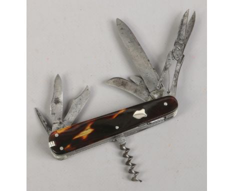 A rare 19th century ten blade multi tool folding pocket knife with tortoiseshell scales. Blade stamped G. Zimmer. 