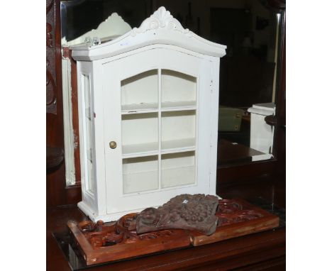 A painted wall mounted display cabinet, carved fruitwood carving and two wall brackets with glass shelf.