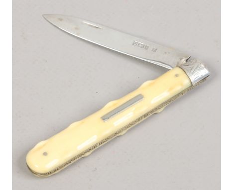 A Victorian silver folding fruit knife with carved ivory scales by William Padley & Son. Assayed Sheffield 1901.