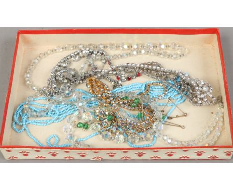 A tray of vintage necklets including aurora borealis beads and white paste etc.