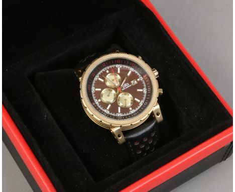 A Delorean automatic 21 jewels wristwatch with water resistant case, three subsidiary dials for day month and hour, date cale
