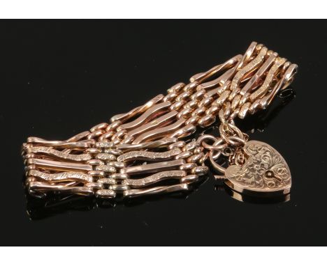 A Victorian 9ct gold gate bracelet with heart shaped clasp, 18.2 grams. 