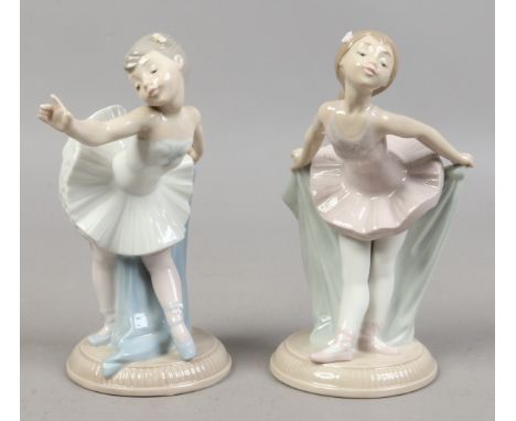 Two Nao figures of young ballet dancers.