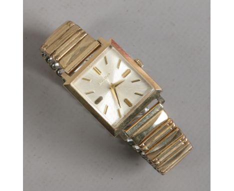 A gentlemans Bulova manual bracelet watch with sunburst dial and baton markers c1960s.