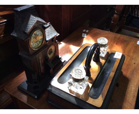 A small wooden house shaped barometer/clock and a mahogany ink tray with drawer.