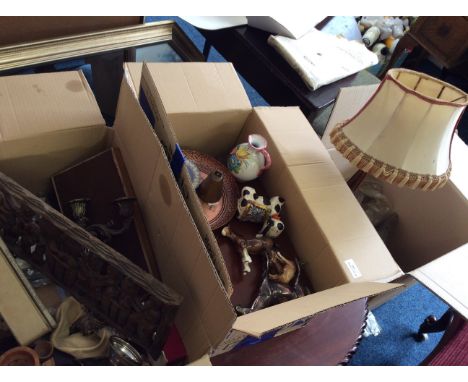 Three boxes of various items including Wedgwood plate, jug, Beswick horses, lamp, nut cracker, silverware etc.